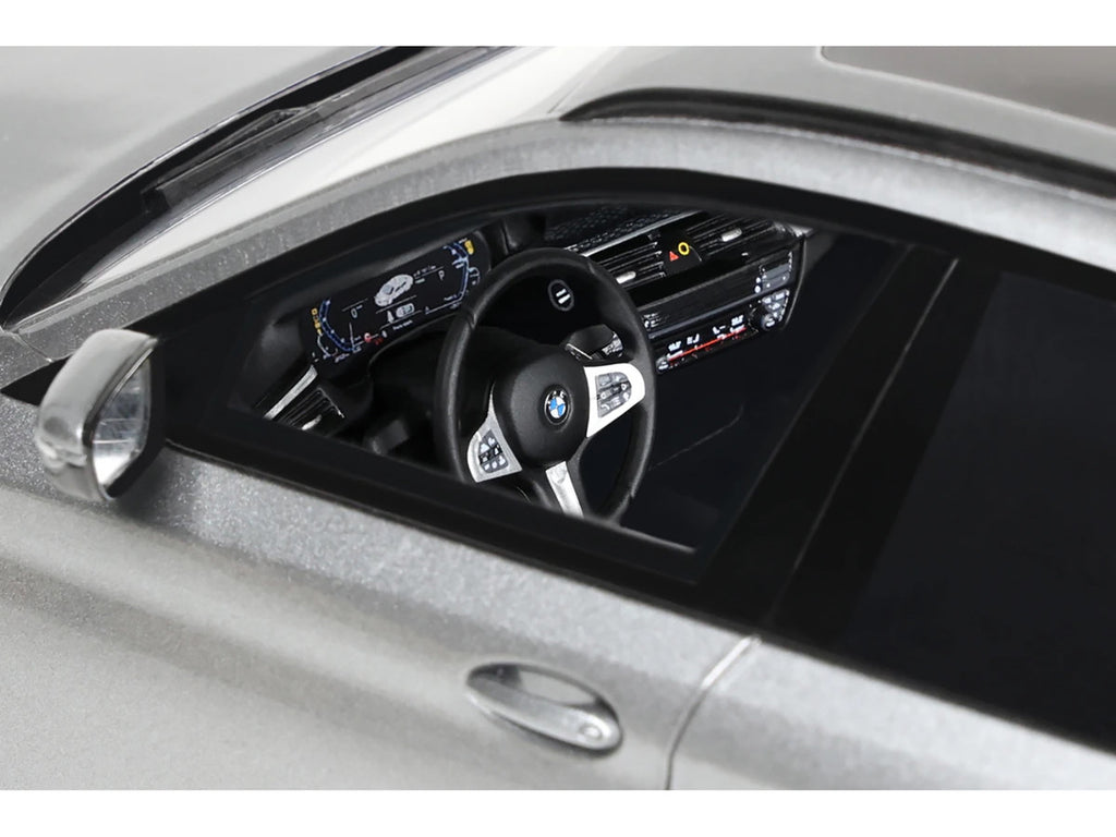 1/18 scale 2023 BMW 530E model car in silver metallic resin with highly detailed exterior — view 3
