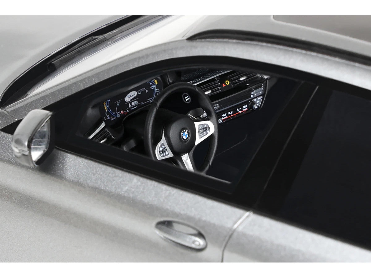 1/18 scale 2023 BMW 530E model car in silver metallic resin with highly detailed exterior — view 3