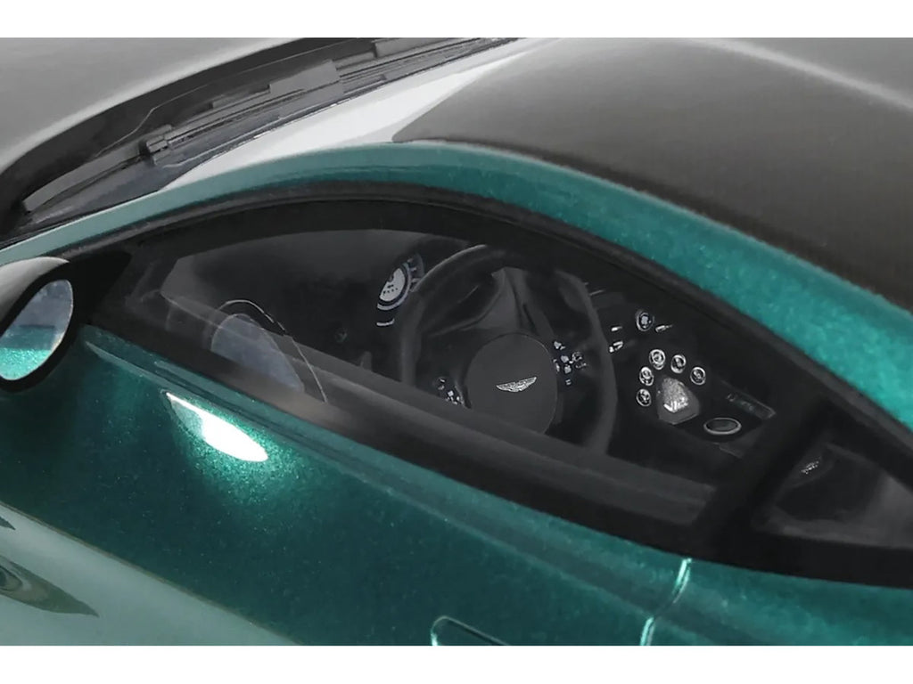 1/18 scale Aston Martin Vantage V12 model car in British Racing Green with black hood — view 3