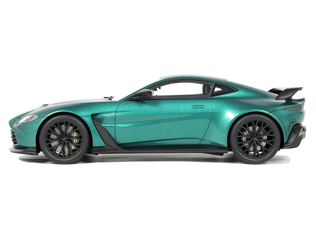 1/18 scale Aston Martin Vantage V12 model car in British Racing Green with black hood