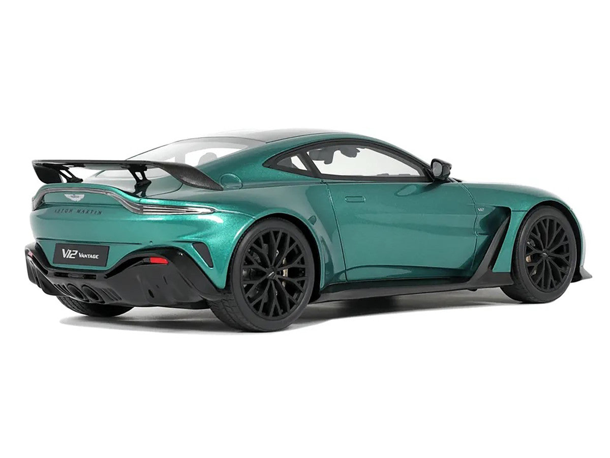 1/18 scale Aston Martin Vantage V12 model car in British Racing Green with black hood — view 2