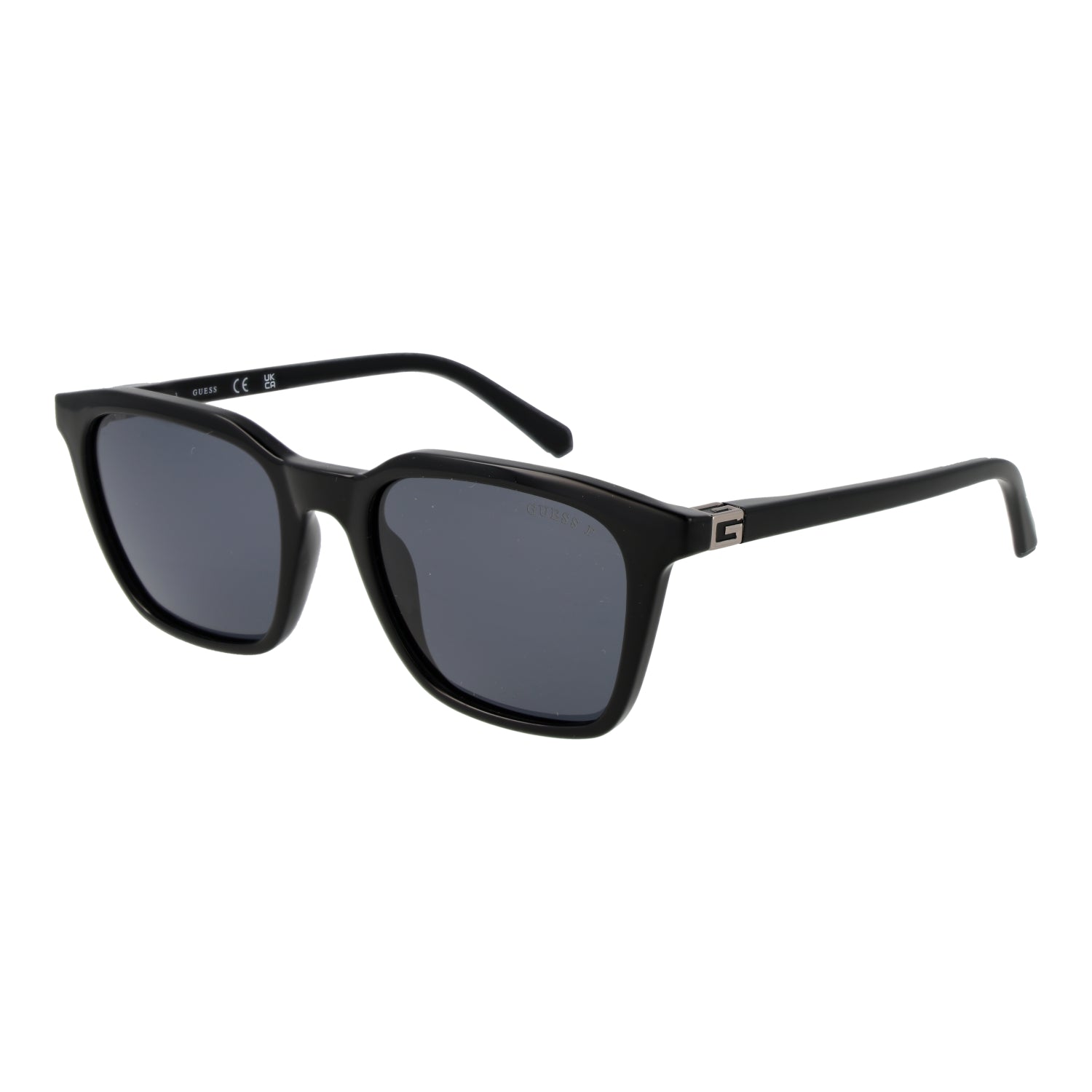 Guess men's sunglasses with dark tinted lenses and sleek modern frame design