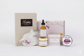 Pampering Mother's Day spa gift box with lavender soap, body oil, candle, and cotton eye mask
