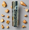 Organic ginger lip balm in an eco-friendly brown push-up paper tube packaging for sustainable skincare