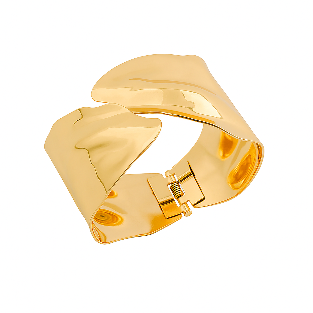 Gold sculpted cuff bracelet with bold contemporary design and smooth polished metallic finish