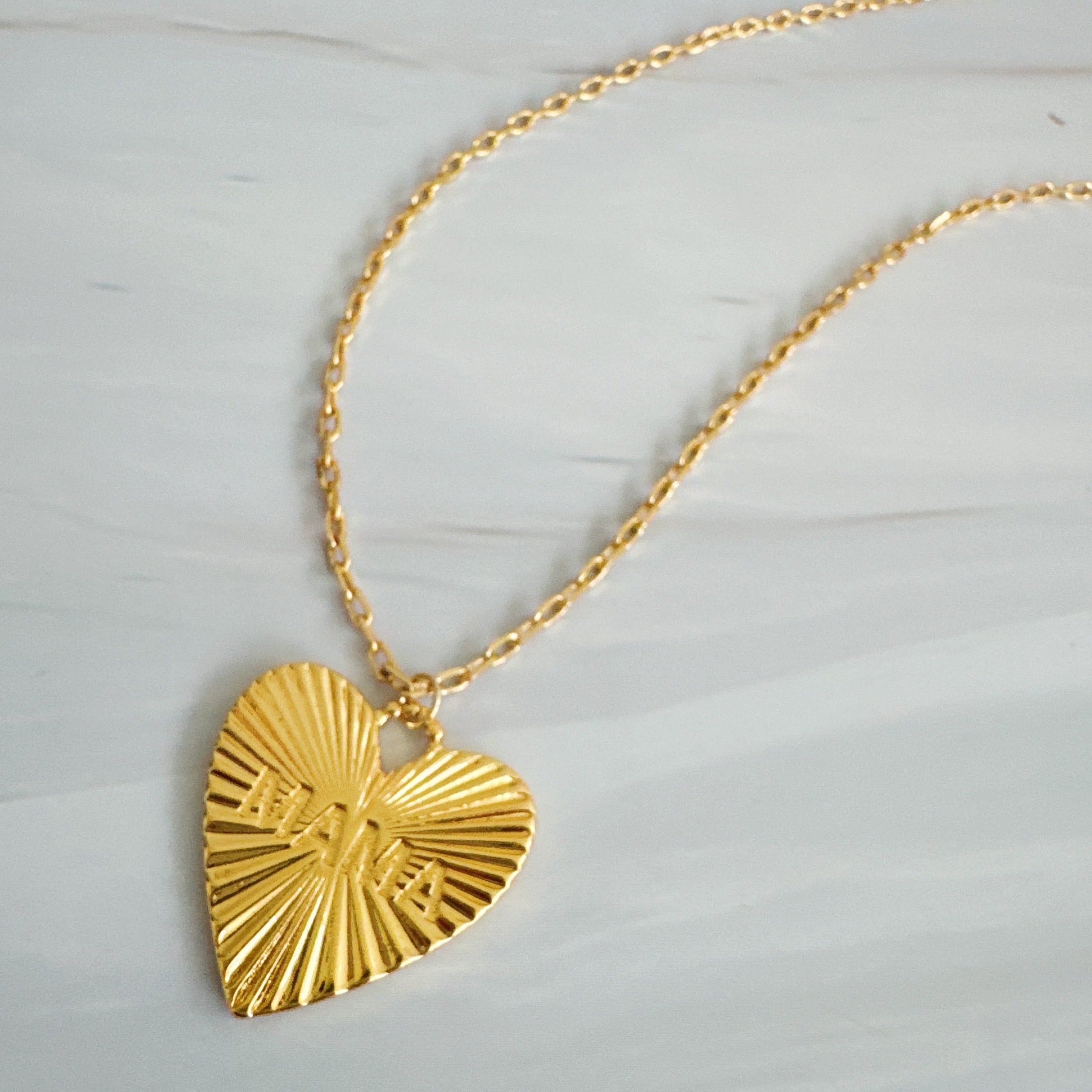 Golden glow mama heart necklace, 18K gold plated brass chain with engraved sunburst pendant. — view 2