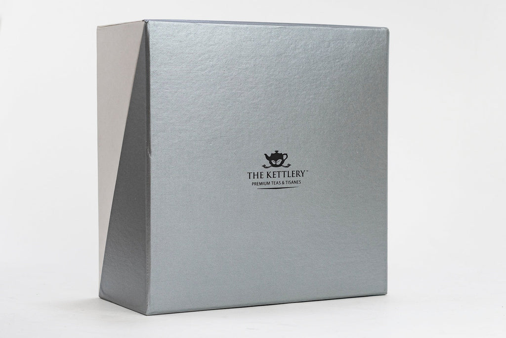 Twin tea gift set featuring two airtight storage tins and a stainless steel stick infuser. — view 2