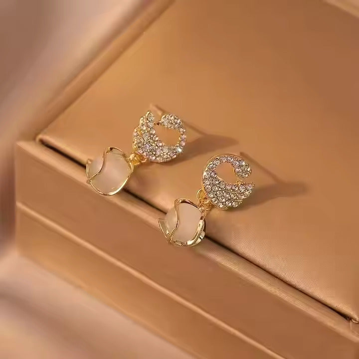 Cozy crystal swan drop earrings with delicate crystal-encrusted wings and dangle design — view 4
