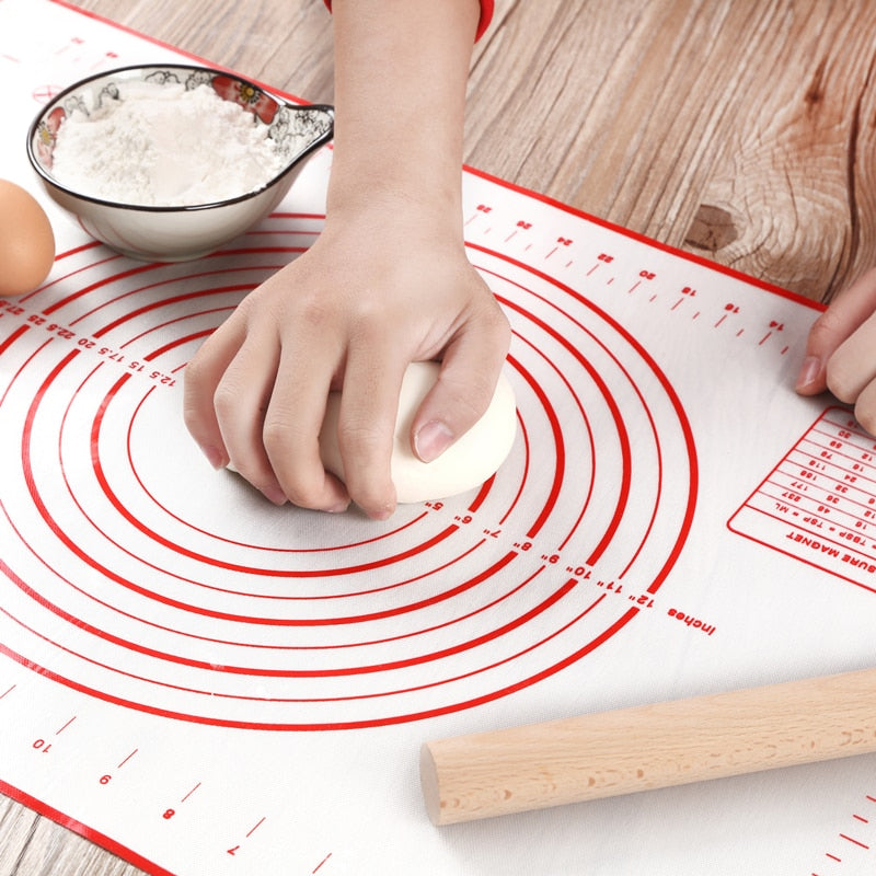 Large 60x40cm non-stick silicone baking mat and dough maker on a kitchen countertop — view 2