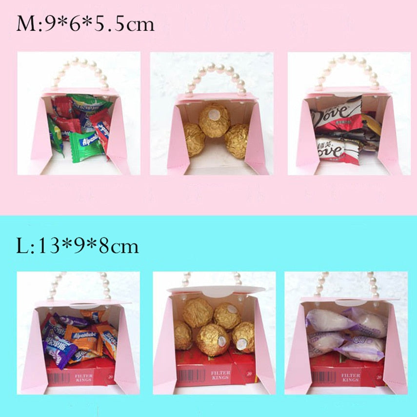 Marble pattern party favor gift boxes with faux pearl handles and decorative ribbons. — view 4
