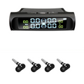 Black solar powered wireless tire pressure monitor with colorful digital dashboard display and four sensors