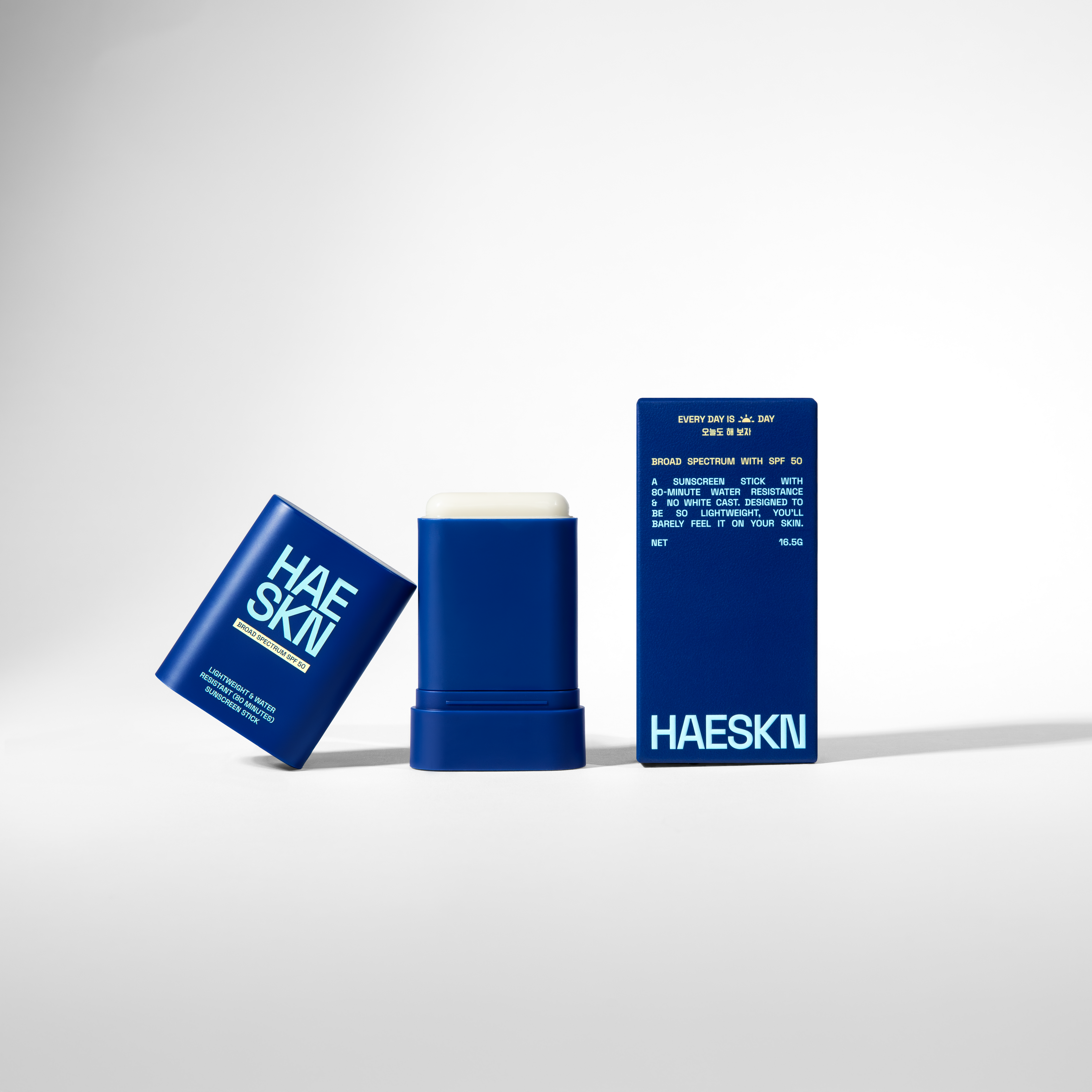 HAESKN SPF 50 sunscreen stick in a sleek, portable container for easy daily application. — view 3