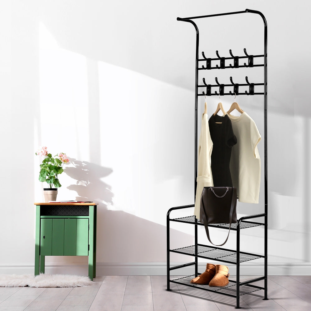 Black metal Artiss clothes rack with three tier shelving and eight coat hooks on display