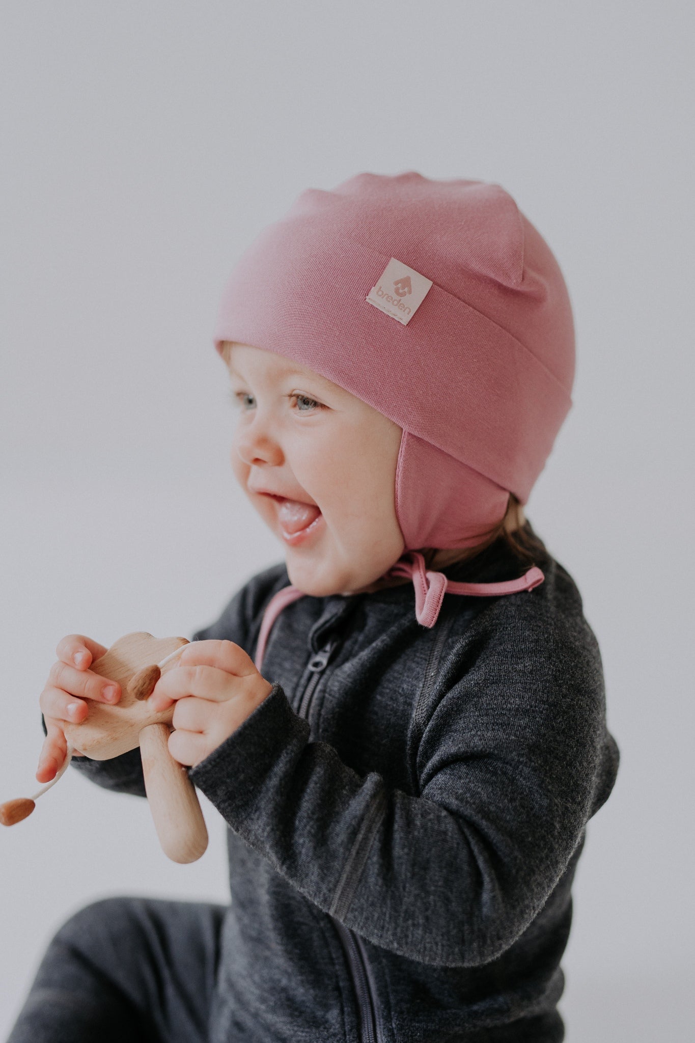 Happy baby spring and autumn hat with secure under chin tie strings and windproof quadruple layered brim — view 2