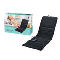 Luxury full body massage mat with heat therapy unrolled on a comfortable bed or sofa