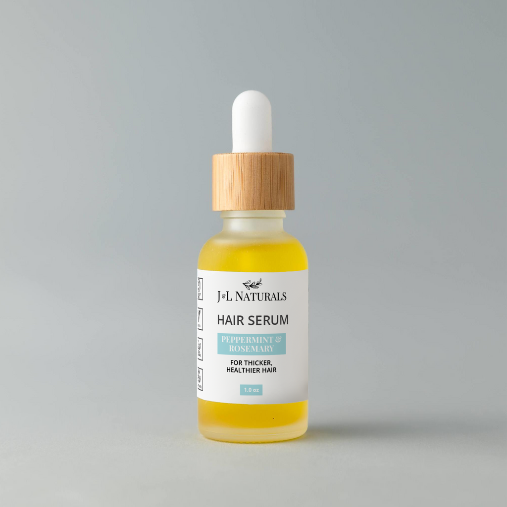 Vegan hair serum in a one ounce glass dropper bottle with natural botanical oils — view 4