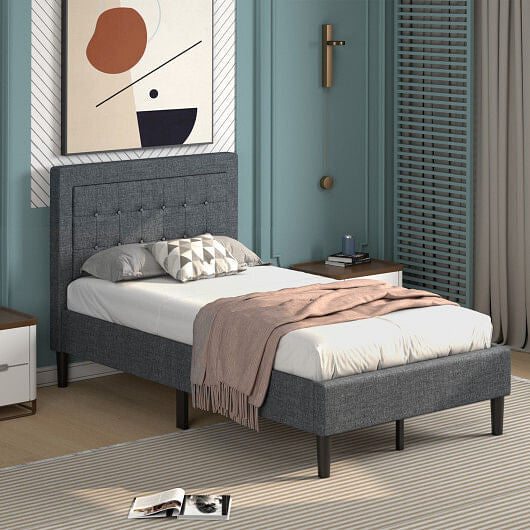 Twin size upholstered bed frame featuring a grey button tufted headboard and under-bed storage clearance — view 2