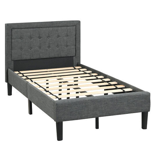 Twin size upholstered bed frame featuring a grey button tufted headboard and under-bed storage clearance
