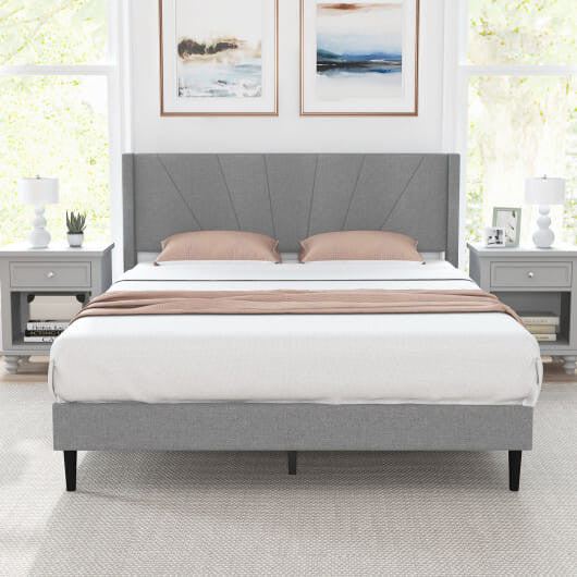 Twin wingback bed frame in linen upholstery with quilted headboard and sturdy solid wood legs