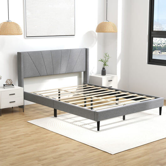 Twin wingback bed frame in linen upholstery with quilted headboard and sturdy solid wood legs — view 2