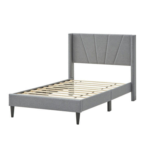 Twin wingback bed frame in linen upholstery with quilted headboard and sturdy solid wood legs — view 5