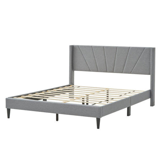 Twin wingback bed frame in linen upholstery with quilted headboard and sturdy solid wood legs — view 10