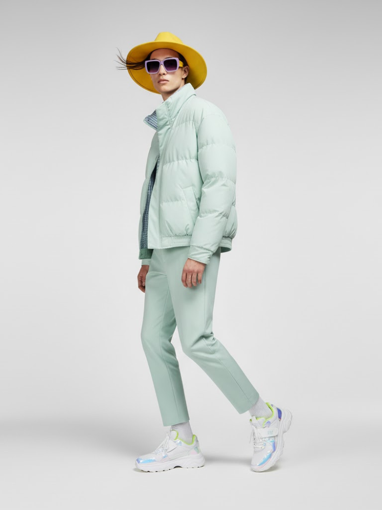Men's mint green puffer jacket featuring a high collar, lightweight quilted fabric, and minimalist design. — view 2