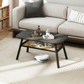 Dark gray 2-tier rectangular center coffee table with woven rattan storage shelf and rubber wood legs