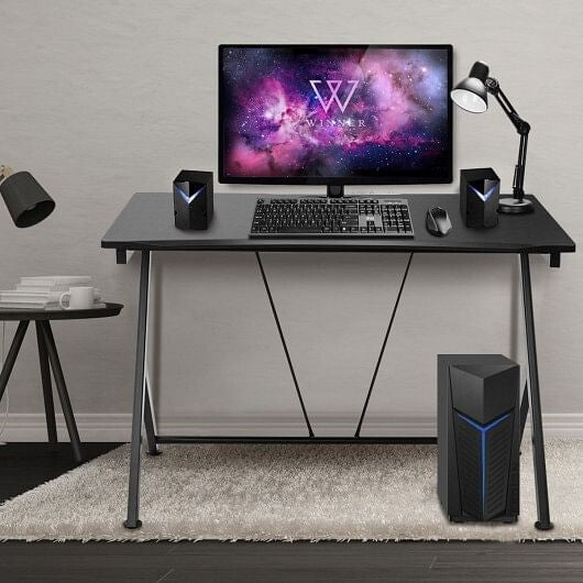 Modern ergonomic computer desk featuring a compact steel frame and curved wooden desktop — view 2