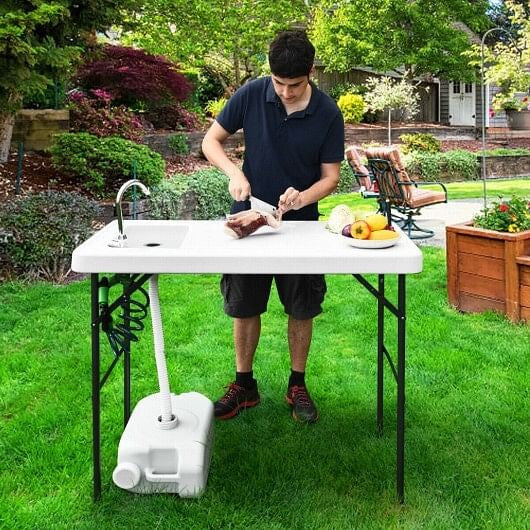 Folding camping cleaning table with integrated sink, extending sprayer, and durable white plastic workspace surface. — view 3