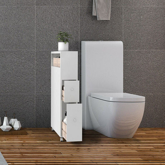 Slim bathroom storage cabinet in white with two slide out drawers and rolling caster wheels — view 2