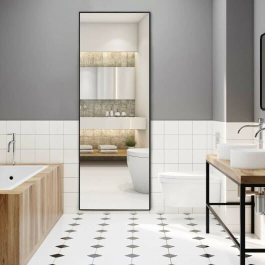 59-inch full length golden mirror with aluminum frame leaning against a modern bedroom wall — view 3