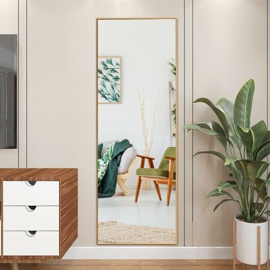 59-inch full length golden mirror with aluminum frame leaning against a modern bedroom wall — view 7