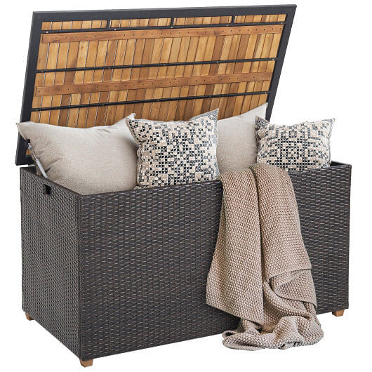 134 gallon brown rattan outdoor storage box with solid acacia wood top and elevated legs — view 3