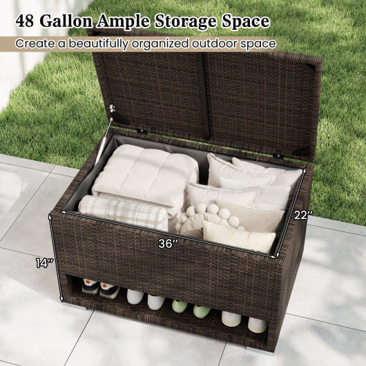 Brown PE rattan outdoor storage bin with waterproof liner and open lid on a patio. — view 4