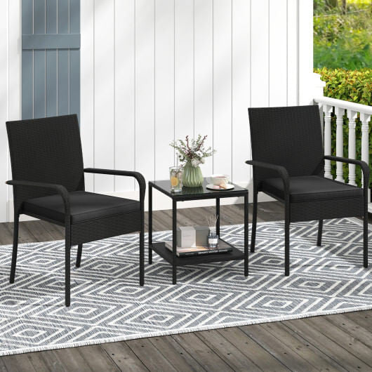Black 3-piece PE rattan patio furniture set with seat cushions and tempered glass table
