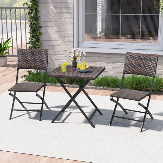 3 piece brown rattan bistro set with folding dining table and two ergonomic wicker chairs