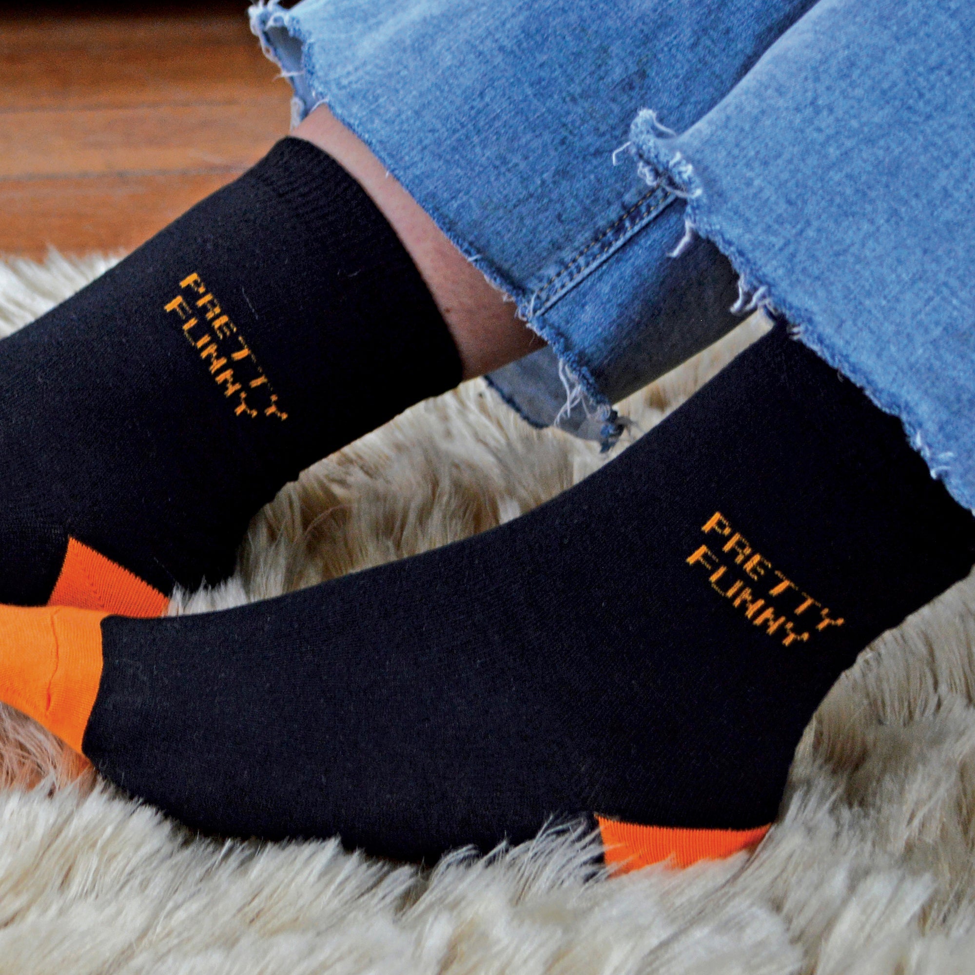 Six pack of women's black novelty socks with colourful heels toes and uplifting motif words — view 4