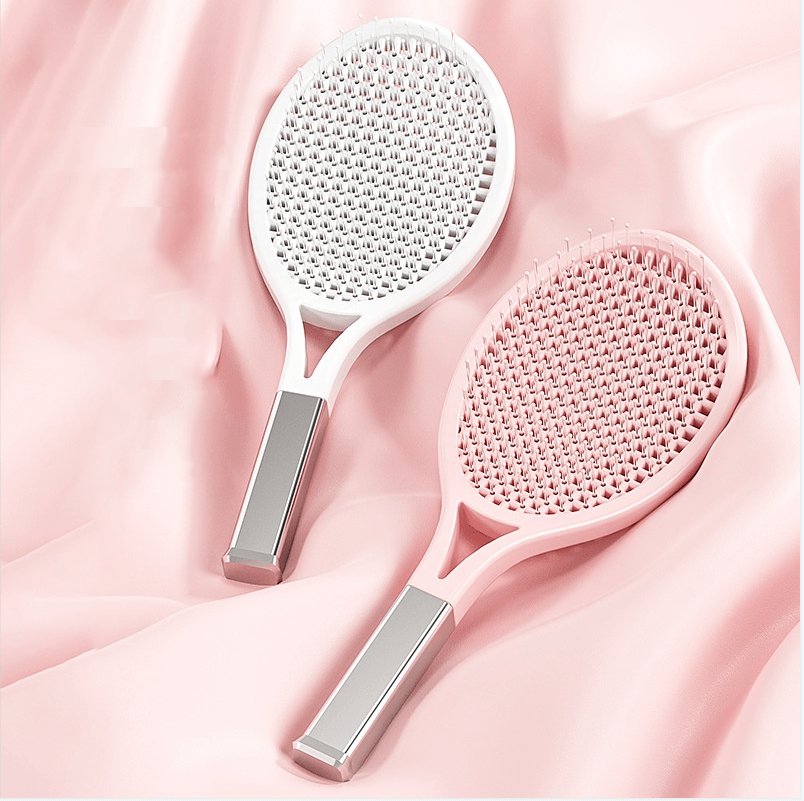 Large curved vented hairbrush detangling comb for fast styling and scalp massage.