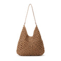 Large handmade crochet beach bag with woven hollow out triangle design and shoulder strap