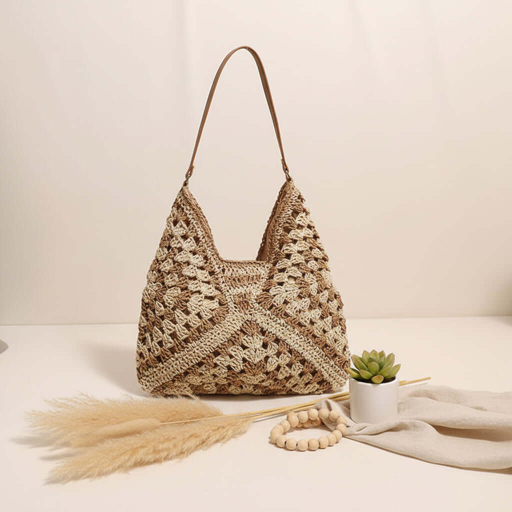 Large handmade crochet beach bag with woven hollow out triangle design and shoulder strap — view 4