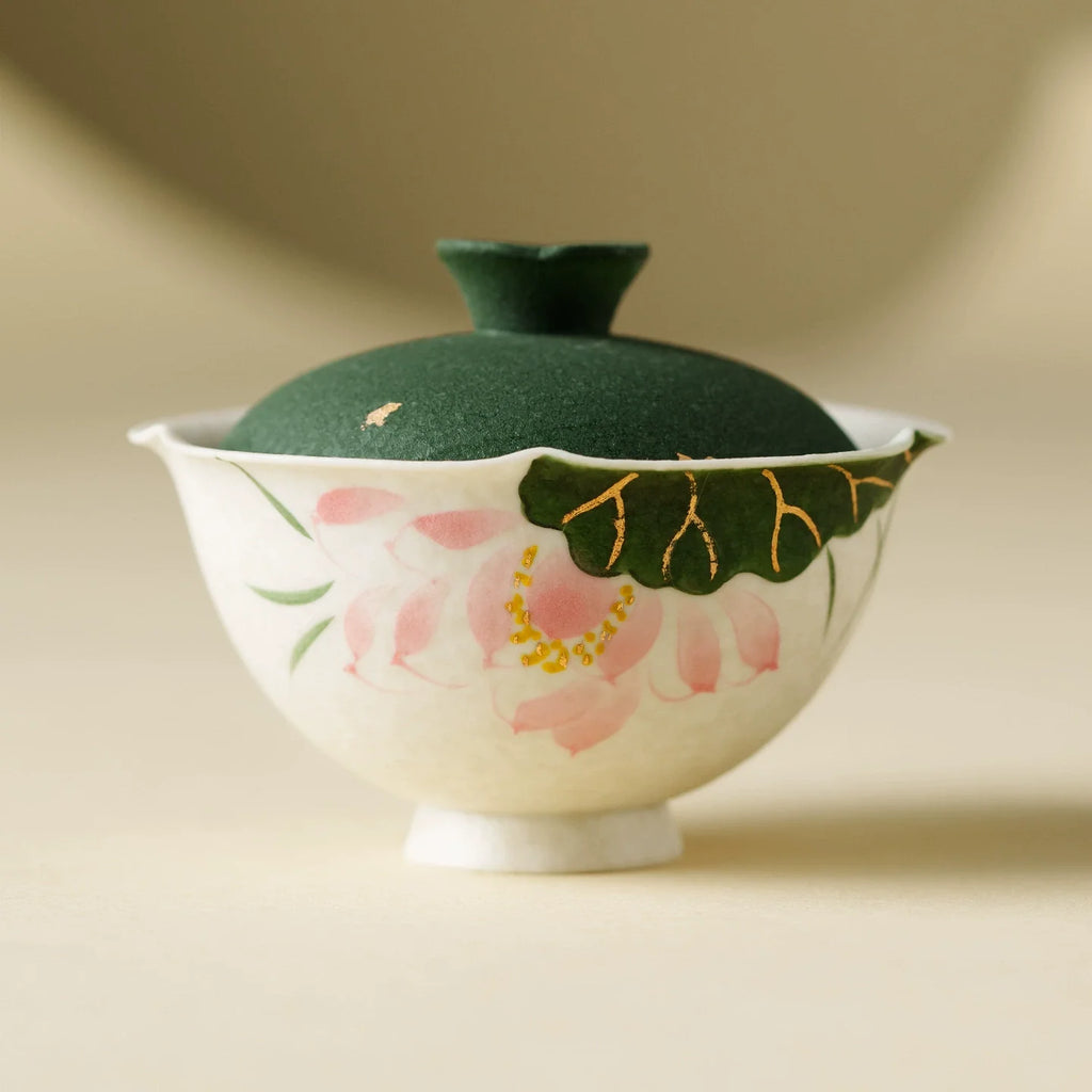 Handmade ceramic gaiwan with green lid and hand-painted pink lotus flower motif