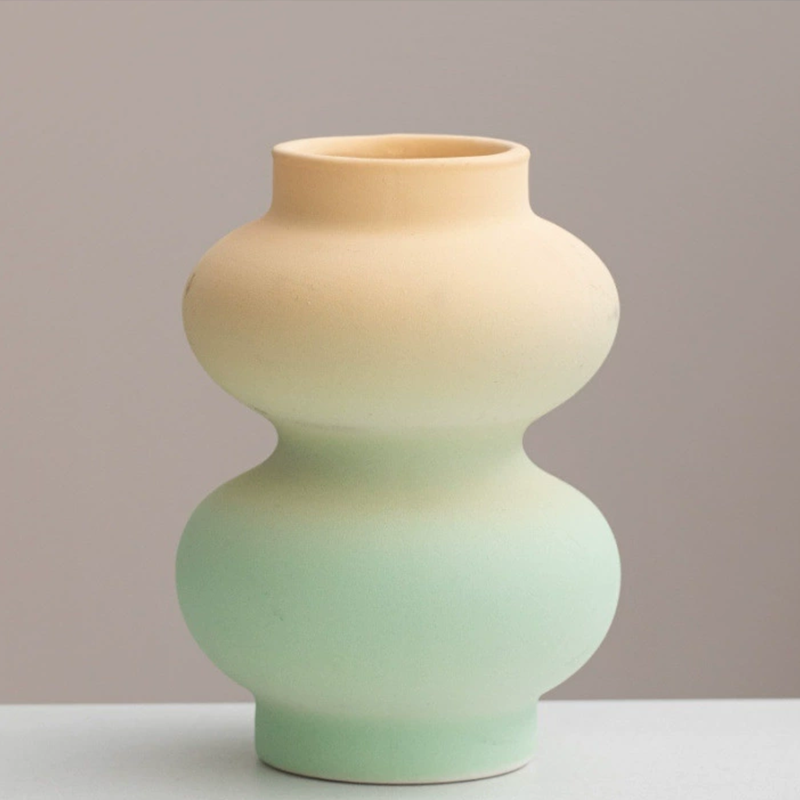 Handmade dopamine gradient ceramic vase with a modern geometric shape and smooth matte finish