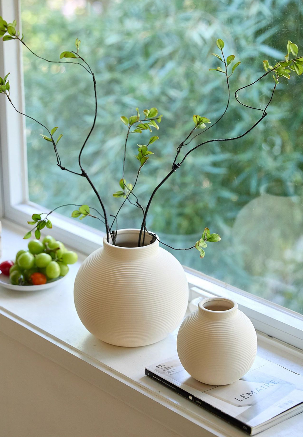 Minimalist ribbed ceramic vase in matte white, elegant unglazed textured centerpiece for modern home decor — view 5