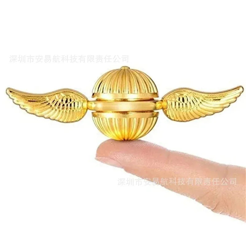 Golden Snitch metal fidget spinner in brilliant gold finish for stress relief and anxiety reduction
