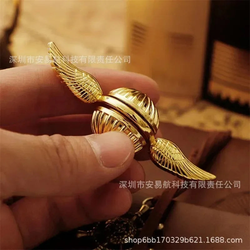 Golden Snitch metal fidget spinner in brilliant gold finish for stress relief and anxiety reduction — view 2