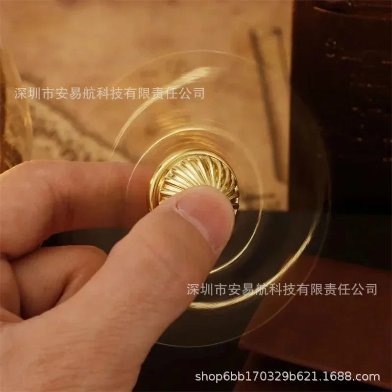 Golden Snitch metal fidget spinner in brilliant gold finish for stress relief and anxiety reduction — view 3
