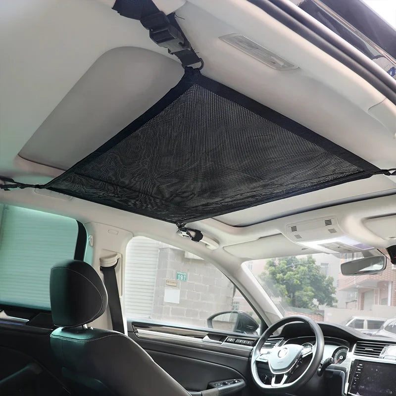 Black SUV ceiling storage net cargo organizer made of breathable mesh with adjustable attachment buckles — view 3