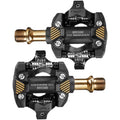 Gold and black carbon composite self-locking SPD mountain bike pedals with chrome steel axles