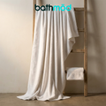 Luxury organic bath sheets in natural white, folded two-pack made of plush Turkish cotton.